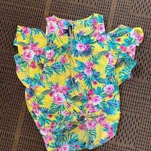 Cut out shoulder top with necklace